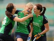 18 June 2011; Ireland's Chloe Watkins, centre, is congratulated by team-mates Aine Connery, left, and Emma Smyth, after scoring their side's second goal against India. ESB Electric Ireland Champions Challenge, Ireland v India, National Hockey Stadium, UCD, Belfield, Dublin. Picture credit: Brendan Moran / SPORTSFILE