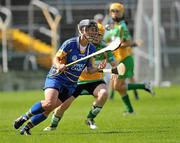 18 June 2011; Jill Horan, Tipperary, in action against Jean Brady, Offaly. All-Ireland Senior Camogie Championship, Round 2, in association with RTE Sport, Tipperary v Offaly, Semple Stadium, Thurles, Co. Tipperary. Picture credit: Barry Cregg / SPORTSFILE