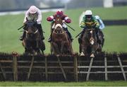 21 January 2017; Jezki, right, with Barry Geraghty up, jumps the last on their way to winning The Race Displays Event Signage Hurdle from second place Renneti, left, with Ruby Walsh and third place Tombstone, centre, with Jack Kennedy during the Navan Races at Navan in Co. Meath.   Photo by Matt Browne/Sportsfile