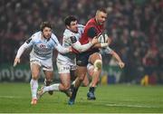 21 January 2017; Simon Zebo is tackled by Marc Andreu, left, and Etienne Dussartre of Racing 92 during the European Rugby Champions Cup Pool 1 Round 6 match between Munster and Racing 92 at Thomond Park in Limerick. Photo by Diarmuid Greene/Sportsfile