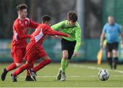 22 January 2017; Eóin McSweeney of Galway in action against Uniss Kargbo, centre, and Ronan O'Brien of Cork during the U-15 SFAI SUBWAY Championship 2016-17 match between Galway and Cork at Cahir Park AFC in Cahir, Tipperary. Photo by Eóin Noonan/Sportsfile