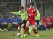 22 January 2017; Liam Corcoran of Galway in action against Pierce Cummins of Cork during the U-15 SFAI SUBWAY Championship 2016-17 match between Galway and Cork at Cahir Park AFC in Cahir, Tipperary. Photo by Eóin Noonan/Sportsfile