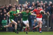 22 January 2017; Tommy Durnin of Louth in action against Sean Curran of Meath during the Bord na Mona O'Byrne Cup semi-final match between Meath and Louth at Páirc Táilteann in Navan, Co. Meath. Photo by David Fitzgerald/Sportsfile