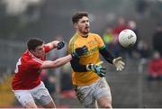 22 January 2017; Jack Hannigan of Meath in action against Conal McKeever of Louth during the Bord na Mona O'Byrne Cup semi-final match between Meath and Louth at Páirc Táilteann in Navan, Co. Meath. Photo by David Fitzgerald/Sportsfile