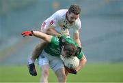 22 January 2017; Aidan Breen of Fermanagh is tackled by Niall Sludden of Tyrone during the Bank of Ireland Dr. McKenna Cup semi-final match between Tyrone and Fermanagh at St Tiernach's Park in Clones, Co. Monaghan. Photo by Oliver McVeigh/Sportsfile