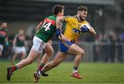 22 January 2017; Ultan Harney of Roscommon is tackled by Cillian O’Connor of Mayo during the Connacht FBD League Section A Round 3 match between Roscommon and Mayo at St. Brigids GAA Club in Kiltoom, Co. Roscommon.  Photo by Ramsey Cardy/Sportsfile