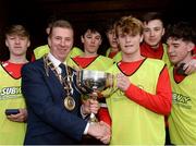 22 January 2017; Cork captain Robert Greaney O'Brien is presented with the cup by Chairman of the SFAI John Earley after the U-15 SFAI SUBWAY Championship 2016-17 match between Galway and Cork at Cahir Park AFC in Cahir, Tipperary. Photo by Eóin Noonan/Sportsfile