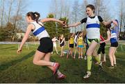 22 January 2017; Dunboyne A.C. teammates pass the baton during the Girl's U14 event at the Irish Life Health Intermediate & Juvenile Inter Club Relay at Palace Grounds in Tuam, Co.Galway.  Photo by Sam Barnes/Sportsfile