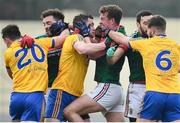 22 January 2017; Mayo players, from left, David Drake, Danny Kirby and Kevin McLoughlin tussle with Roscommon players, from left, John McManus, Kevin Higgins and Ultan Harney during the Connacht FBD League Section A Round 3 match between Roscommon and Mayo at St. Brigids GAA Club in Kiltoom, Co. Roscommon.  Photo by Ramsey Cardy/Sportsfile