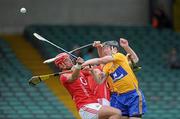 19 June 2011; Niall Gilligan and Martin Duggan, Clare, in action against Eoin Dillon, 3, Seamus Corry, Cork. Munster GAA Hurling Intermediate Championship Semi-Final, Clare v Cork, Gaelic Grounds, Limerick. Picture credit: Matt Browne / SPORTSFILE