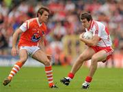 19 June 2011; Charlie Kielt, Derry, in action against Kevin Dyas, Armagh. Ulster GAA Football Senior Championship Semi-Final, Derry v Armagh, St Tiernach's Park, Clones, Co. Monaghan. Picture credit: Stephen McCarthy / SPORTSFILE