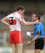 19 June 2011; Enda Muldoon, Derry, pleads his innocence with referee David Coldrick. Ulster GAA Football Senior Championship Semi-Final, Derry v Armagh, St Tiernach's Park, Clones, Co. Monaghan. Picture credit: Stephen McCarthy / SPORTSFILE