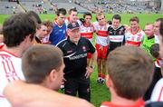 19 June 2011; Derry manager John Brennan speaks to his players after the game. Ulster GAA Football Senior Championship Semi-Final, Derry v Armagh, St Tiernach's Park, Clones, Co. Monaghan. Picture credit: Dáire Brennan / SPORTSFILE