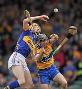 19 June 2011; Lar Corbett, Tipperary, in action against Pat Vaughan, Clare. Munster GAA Hurling Senior Championship Semi-Final, Clare v Tipperary, Gaelic Grounds, Limerick. Picture credit: David Maher / SPORTSFILE