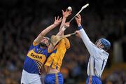 19 June 2011; John O'Brien, Tipperary, in action against Cian Dillion and goalkeeper Philip Brennan, Clare. Munster GAA Hurling Senior Championship Semi-Final, Clare v Tipperary, Gaelic Grounds, Limerick. Picture credit: David Maher / SPORTSFILE