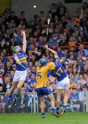 19 June 2011; Noel McGrath, left, and Pa Bourke, Tipperary, in action against Patrick O'Connor, Clare. Munster GAA Hurling Senior Championship Semi-Final, Clare v Tipperary, Gaelic Grounds, Limerick. Picture credit: Matt Browne / SPORTSFILE