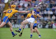 19 June 2011; Gearoid Ryan, Tipperary, in action against John Conlon, left, and Cormac O'Donnovan, Clare. Munster GAA Hurling Senior Championship Semi-Final, Clare v Tipperary, Gaelic Grounds, Limerick. Picture credit: Matt Browne / SPORTSFILE