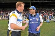19 June 2011; Declan Ryan, left, Tipperary manager, shakes hands with Clare manager Ger O'Loughlin at the end of the game. Munster GAA Hurling Senior Championship Semi-Final, Clare v Tipperary, Gaelic Grounds, Limerick. Picture credit: David Maher / SPORTSFILE