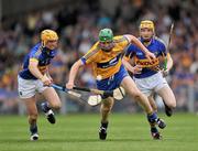 19 June 2011; Fergal Lynch, Clare, in action against Shane McGrath, left, and Lar Corbett, Tipperary. Munster GAA Hurling Senior Championship Semi-Final, Clare v Tipperary, Gaelic Grounds, Limerick. Picture credit: David Maher / SPORTSFILE