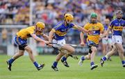 19 June 2011; Pa Bourke, Tipperary, in action against Cian Dillon, Clare. Munster GAA Hurling Senior Championship Semi-Final, Clare v Tipperary, Gaelic Grounds, Limerick. Picture credit: Matt Browne / SPORTSFILE