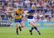 19 June 2011; Seamus Callanan, Tipperary, in action against Patrick O'Connor, Clare. Munster GAA Hurling Senior Championship Semi-Final, Clare v Tipperary, Gaelic Grounds, Limerick. Picture credit: Matt Browne / SPORTSFILE