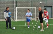 18 June 2010; Denis Hyland, left, Development Officer at the Football Association of Ireland, speaking to footballers, from left, Craig Dowling, from Carlow town, Simon Baker, from Limerick, and James Boyle, from Dunloe, Co. Donegal, during Ireland's first amputee football club training session. Mountview Communinty Sports Centre, Clonsilla, Co. Dublin. Picture credit: Brendan Moran / SPORTSFILE