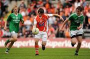 19 June 2011; Ryan McShane, Armagh, in action against Niall Maguire, left, and Che Cullen, Fermanagh. Fermanagh v Armagh, Ulster GAA Football Minor Championship Semi-Final, St Tiernach's Park, Clones, Co. Monaghan. Picture credit: Stephen McCarthy / SPORTSFILE