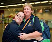 20 June 2011; Coach Teresa McCabe with Special Olympics athlete, Gary McCabe, from Clara, Co. Offaly, Team Ireland, sponsored by eircom, who departed for the 2011 Special Olympics World Summer Games in Athens. A total of 126 athletes from Ireland will compete at these prestigious Games which will run from 25th June - 4th July. To follow Team Ireland’s progress at the Games please visit www.specialolympics.ie/athens. Dublin Airport, Dublin. Picture credit: Ray McManus / SPORTSFILE