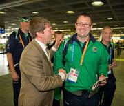 20 June 2011; Special Olympics Ireland CEO Matt English offers good wishes to Greg Kirkpatrick, from Saintfield, Co. Down, Team Ireland, sponsored by eircom, who departed for the 2011 Special Olympics World Summer Games in Athens. A total of 126 athletes from Ireland will compete at these prestigious Games which will run from 25th June - 4th July. To follow Team Ireland’s progress at the Games please visit www.specialolympics.ie/athens. Dublin Airport, Dublin. Picture credit: Ray McManus / SPORTSFILE