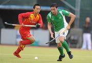 20 June 2011; Christopher Cargo, Ireland, on the attack against China. UCD Men's 4 Nations Tournament, Ireland v China, UCD, Belfield, Dublin. Picture credit: Brendan Moran / SPORTSFILE