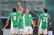 20 June 2011; Timothy Cockram, 2nd from right, Ireland, celebrates after scoring his side's fourth goal against China with team-mates Christopher Cargo, 8, Mitch Darling and Phelie Maguire, 22. UCD Men's 4 Nations Tournament, Ireland v China, UCD, Belfield, Dublin. Picture credit: Brendan Moran / SPORTSFILE