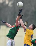 22 January 2017; Danny Kirby of Mayo in action against Kevin Higgins of Roscommon during the Connacht FBD League Section A Round 3 match between Roscommon and Mayo at St. Brigids GAA Club in Kiltoom, Co. Roscommon.  Photo by Ramsey Cardy/Sportsfile
