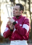 22 January 2017; Jockey Sean Flanagan with the trophy after winning The Coral.ie Hurdle on Ice Cold Soul during the Leopardstown Races at Leopardstown Racecourse in Dublin. Photo by Cody Glenn/Sportsfile