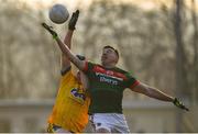 22 January 2017; Evan Regan of Mayo is tackled by Niall McInerney of Roscommon during the Connacht FBD League Section A Round 3 match between Roscommon and Mayo at St. Brigids GAA Club in Kiltoom, Co. Roscommon.  Photo by Ramsey Cardy/Sportsfile