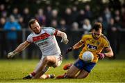 22 January 2017; Donie Smith of Roscommon is tackled by Rob Hennelly of Mayo during the Connacht FBD League Section A Round 3 match between Roscommon and Mayo at St. Brigids GAA Club in Kiltoom, Co. Roscommon.  Photo by Ramsey Cardy/Sportsfile