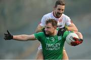 22 January 2017; Aidan Breen of Fermanagh in action against Niall Sludden of Tyrone during the Bank of Ireland Dr. McKenna Cup semi-final match between Tyrone and Fermanagh at St Tiernach's Park in Clones, Co. Monaghan. Photo by Oliver McVeigh/Sportsfile