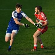 22 January 2017; Emmet McGuckin of Derry in action against Darren Hughes of Monaghan during the Bank of Ireland Dr. McKenna Cup semi-final match between Monaghan and Derry at Athletic Grounds in Armagh. Photo by Philip Fitzpatrick/Sportsfile