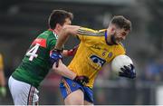 22 January 2017; Ultan Harney of Roscommon is tackled by Cillian O’Connor of Mayo during the Connacht FBD League Section A Round 3 match between Roscommon and Mayo at St. Brigids GAA Club in Kiltoom, Co. Roscommon.  Photo by Ramsey Cardy/Sportsfile