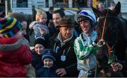 22 January 2017; Jockey Robbie Power with Oscar Sam in the winner's enclosure with Oscar Sam and families of winning connections after the 'Bet & Watch' Irish Racing Live At Coral.ie Handicap Hurdle during the Leopardstown Races at Leopardstown Racecourse in Dublin. Photo by Cody Glenn/Sportsfile