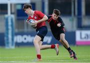 24 January 2017; Benjamin White of Catholic University School is tackled by Jack Atkinson of Wesley College during the Bank of Ireland Fr Godfrey Cup Semi-Final match between Wesley College and Catholic University School at Donnybrook Stadium in Donnybrook, Dublin. Photo by Eóin Noonan/Sportsfile