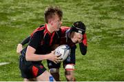 24 January 2017; Tadgh O’Neill of Wesley College is tackled by Daniel Kinlay of Catholic University School during the Bank of Ireland Fr Godfrey Cup Semi-Final match between Wesley College and Catholic University School at Donnybrook Stadium in Donnybrook, Dublin. Photo by Eóin Noonan/Sportsfile