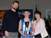 25 January 2017; Iarlaith O'Sullivan of St Josephs Bish Galway is presented with the cup by Jason Killeen and Theresa Walsh, President of Basketball Ireland, after the Subway All-Ireland Schools U16A Boys Cup Final match between St Joes Bish and St Malachys College at the National Basketball Arena in Tallaght, Co Dublin. Photo by Eóin Noonan/Sportsfile