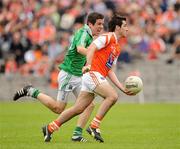 19 June 2011; Michael McKenna, Armagh, in action against Ryan Lyons, Fermanagh. Fermanagh v Armagh, Ulster GAA Football Minor Championship Semi-Final, St Tiernach's Park, Clones, Co. Monaghan. Picture credit: Oliver McVeigh / SPORTSFILE