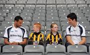 21 June 2011; Ulster Bank GAA stars Craig Dias, left, and Rory O'Carroll pictured with pupils Caitlyn Boylan and Michael McEntegart, from St. Patricks Primary School, Crossmaglen, Co. Armagh, in Croke Park as part of the Ulster Bank/Irish News competition where five lucky classes won a school trip of a lifetime which included a tour of the famous Croke Park Stadium while also meeting some of the biggest GAA stars in the country. Croke Park, Dublin. Picture credit: Barry Cregg / SPORTSFILE