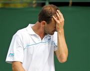 21 June 2011; A dejected Conor Niland, Ireland, following his 3 sets to 2 defeat to Adrian Mannarino, France, after their opening round match. Wimbledon 2011 Gentlemen's Singles Championship Round 1, Conor Niland v Adrian Mannarino. All England Lawn Tennis and Croquet Club, London, England. Picture credit: Ian MacNicol / SPORTSFILE
