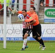 21 June 2011; Eamon Zayed, Derry City, tangles with Sligo Rovers goalkeeper Brendan Clarke. Airtricity League Premier Division, Derry City v Sligo Rovers, Brandywell, Derry. Picture credit: Oliver McVeigh / SPORTSFILE