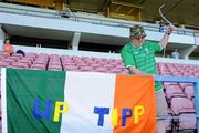 21 June 2011; Republic of Ireland supporter Jimmy Walsh, from Cashel, Co. Tipperary, and father of captain James Walsh, ties up his tricolour flag before the game. UEFA Regions Cup Finals, Group B, Republic of Ireland v Turkey, Cidade de Barcelos, Barcelos, Portugal. Picture credit: Diarmuid Greene / SPORTSFILE