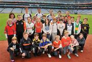 21 June 2011; Ulster Bank GAA stars Craig Dias, Rory O'Carroll, Karl Lacey, pictured with pupils, from St.Patrick's Primary School, Armagh, at Croke Park as part of the Ulster Bank/Irish News competition where five lucky classes won a school trip of a lifetime which included a tour of the famous Croke Park Stadium while also meeting some of the biggest GAA stars in the country. Croke Park, Dublin. Picture credit: David Maher / SPORTSFILE