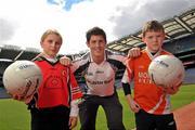 21 June 2011; Ulster Bank GAA star Rory O'Carroll with Eilis O'Hare, and Se Toner, both pupils from St.Patrick's Primary School, Armagh, in Croke Park as part of the Ulster Bank/Irish News competition where five lucky classes won a school trip of a lifetime which included a tour of the famous Croke Park Stadium while also meeting some of the biggest GAA stars in the country. Croke Park, Dublin. Picture credit: David Maher / SPORTSFILE