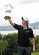 22 June 2011; Golfer Rory McIlroy with the US Open Championship trophy on his return home following his victory in the Congressional Country Club, Bethesda, Maryland, last weekend. Holywood Golf Club, Holywood, Co. Down. Picture credit: Oliver McVeigh / SPORTSFILE